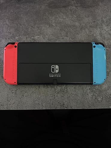 сколько стоит nintendo switch: Nintendo Switch OLED, 64 ГБ встроенной памяти. Модель с неоновыми — 2
