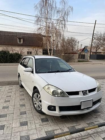 крыло на виндом: Nissan Wingroad: 2001 г., Автомат, Универсал — 3