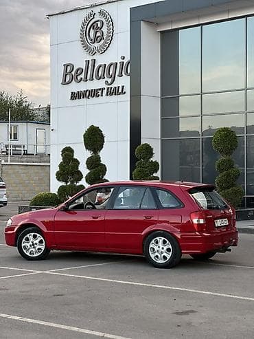 авто лейлек: Mazda 323: 1998 г., 1.5 л, Кол менен иштөөчү, Бензин, Универсал — 7