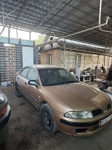 lada 2115: Mitsubishi Carisma: 1999 г., 1.8 л, Автомат, Бензин, Хэтчбэк — 5