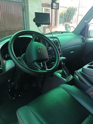 бортово: Kia Bongo (K2500/K2700) — компактный бортовой грузовик свежы гелди — 5