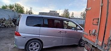 ремонт работы: Минивэн серебристого цвета. - Кузов: компактный однообъёмник с — 2