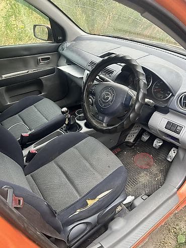 Унаа: Mazda Demio: 2003 г., 1.5 л, Кол менен иштөөчү, Бензин, Хетчбек — 9
