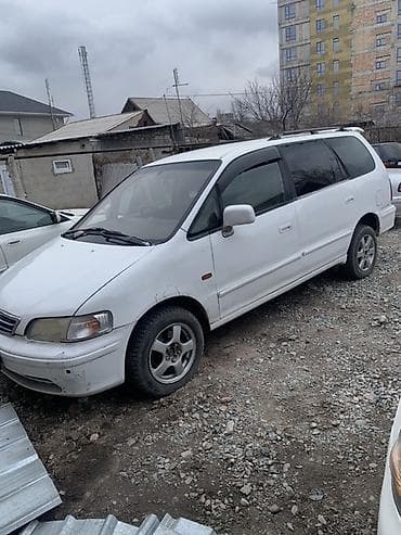 исузи елф: Honda Odyssey: 1997 г., 2.3 л, Автомат, Газ, Минивэн — 1