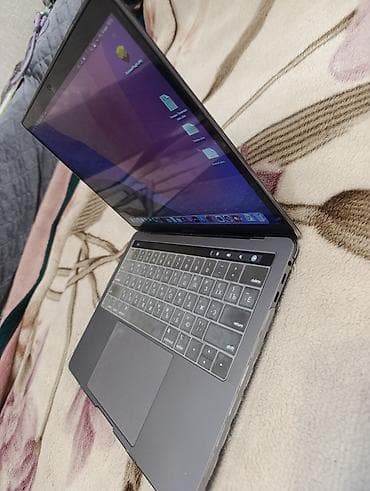 mackbook pro: MacBook Pro 13" (2019, Four Thunderbolt 3 ports) - Процессор: Intel — 6