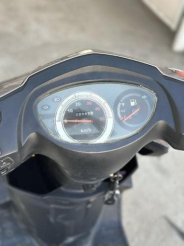 Мототехника: Скутер Regal Raptor серого цвета, предназначенный для городской езды — 6