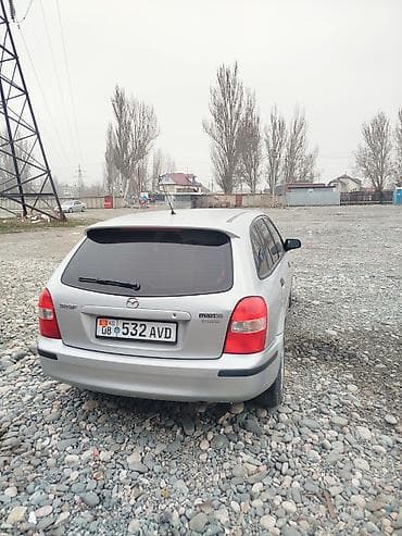 mx 5: Mazda 323: 1999 г., 1.5 л, Ручные, Бензин, Универсал — 4