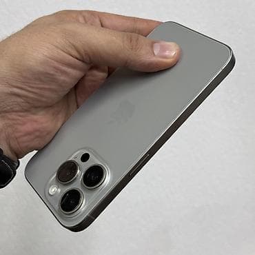 full construction: IPhone 15 Pro, Б/у, 512 ГБ, Natural Titanium, Защитное стекло, Чехол, 88 % — 6