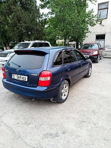 продаю с: Mazda 323: 2001 г., 1.6 л, Автомат, Бензин, Универсал — 5