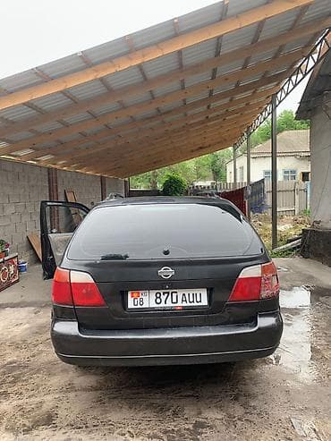 p11: Nissan Primera: 2001 г., 1.8 л, Механика, Бензин, Универсал — 1