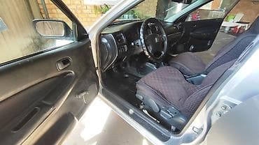 mini coper: Mazda 323: 1997 г., 1.5 л, Механика, Бензин, Седан — 6