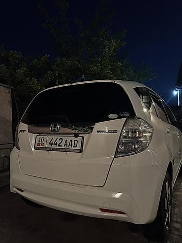 mini ev: Honda Fit: 2012 г., 1.3 л, Вариатор, Гибрид, Хэтчбэк — 3