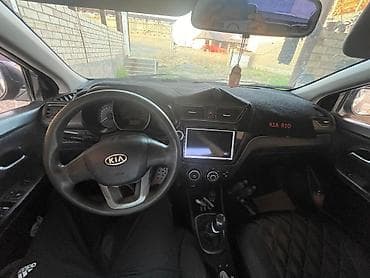 Унаа сатуу: Kia Rio: 2012 г., 1.6 л, Кол менен иштөөчү, Бензин, Седан — 6