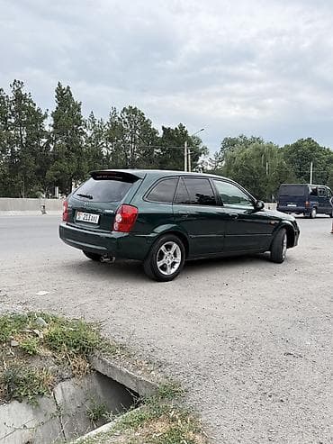 mistra: Mazda 323: 2003 г., 1.6 л, Автомат, Бензин, Универсал — 10