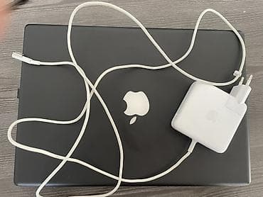 Техника и электроника: Apple MacBook (черный корпус) с зарядным устройством MagSafe — 2