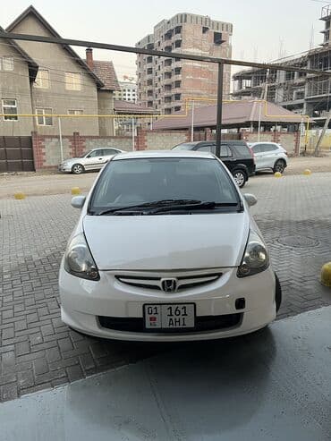 купить чехлы на гольф 4: Honda Fit: 2003 г., 1.3 л, Вариатор, Бензиновая, Хэтчбэк — 1