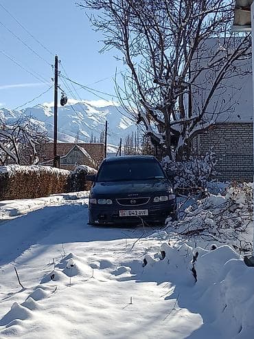 бак мазда демио: Mazda Capella: 1999 г., 1.8 л, Автомат, Бензин, Седан — 9