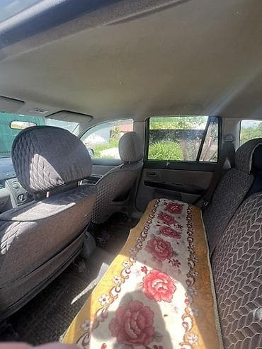 авто чихол: Mazda Demio: 2004 г., Автомат, Бензин, Хэтчбэк — 2