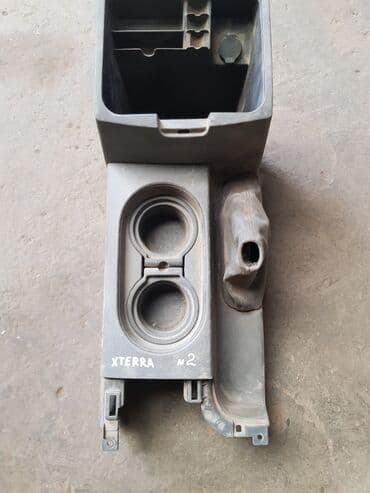 купить ниссан скайлайн в бишкеке: Nissan X Terra торпедо, Ниссан Икстерра Консоль нижняя #2. Икстерра — 1