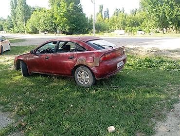 мотоцикл бу: Mazda 323: 1997 г., 1.6 л, Механика, Бензин, Лифтбек — 4