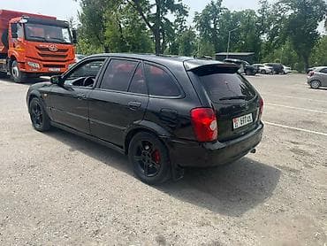 тормозные диск фит: Mazda Familia: 2003 г., 1.6 л, Механика, Бензин, Универсал — 5