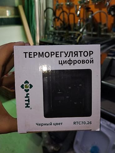 тепл: Цифровой терморегулятор RTC70.26 (черный цвет) Описание: - Настенный — 1