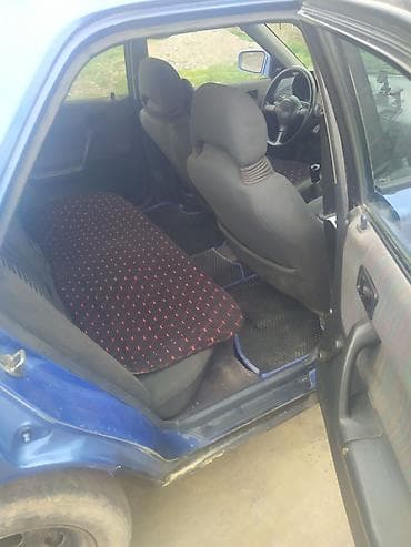 Mazda 323: 1992 г., 1.6 л, Ручные, Бензин, Седан