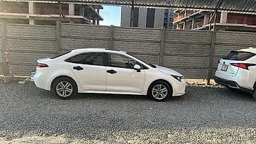 corolla 2004: Toyota Corolla: 2022 г., Гибрид, Седан — 5