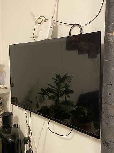 Телевизор LG, 40 дюймовый ш:89см в:50см (тонкие рамки, плоская