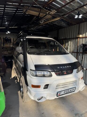 возможен обмен на дом: Mitsubishi Delica: 2003 г., 3 л, Автомат, Бензиновая, Минивэн — 2