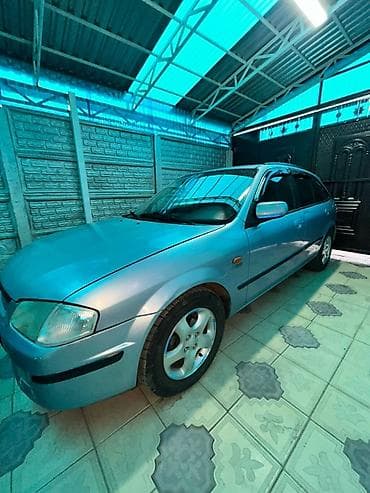 мазда хронос: Mazda 323: 2000 г., 1.5 л, Механика, Бензин, Хэтчбэк — 9