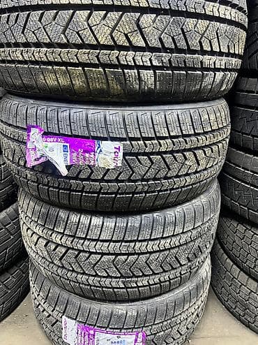 р 19: Зимняя китайская разноширокая шина. Фирма Tourador made in China — 1