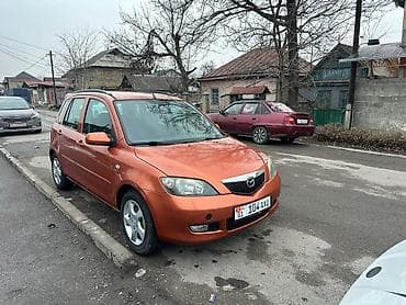 Mazda Demio: 2003 г., 1.4 л, Механика, Бензин