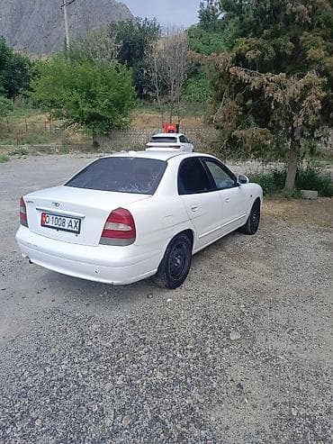 машина некция: Daewoo Nubira: 2000 г., Седан — 7