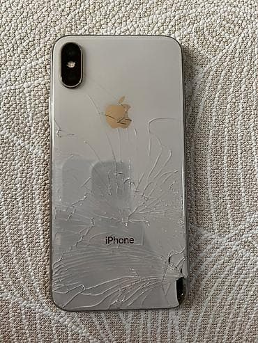IPhone XS, серебристый, 64 ГБ Особенности: - Двойная основная камера