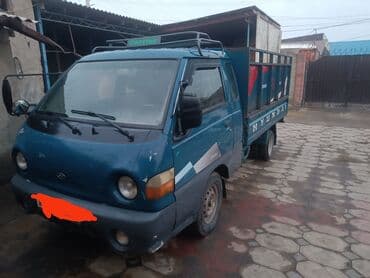 суу ташыгыч: Буйрутма берүү Хендай портер, Курулуш таштандыларын чыгаруу, Жүк ташуучу жумушчусу менен — 7