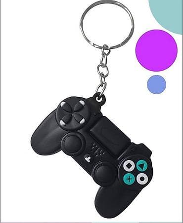Үлпөт көйнөктөрү жана аксессуарлар: Стильный брелок в виде игрового джойстика — идеальный аксессуар для — 2