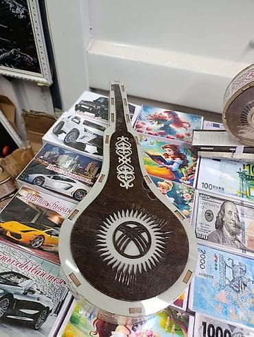 Акча чогултуучу кутулар: Копилка в форме Комуз - Тематический дизайн: корпус выполнен в виде — 2