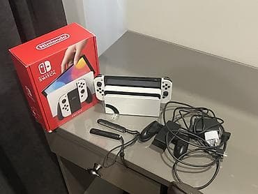 Nintendo Switch OLED: Nintendo Switch OLED (белая версия) Комплектация: - Консоль Nintendo — 3