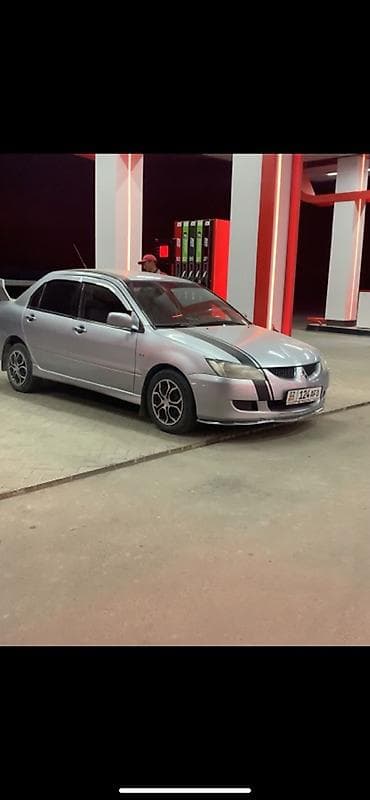 Mitsubishi Lancer: 2004 г., 1.6 л, Типтроник, Бензин, Седан