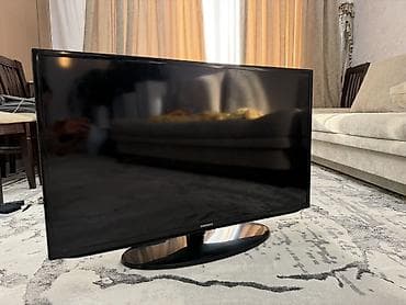 led: Телевизор Samsung, диагональ около 32–37". Плоская панель, тонкая — 1