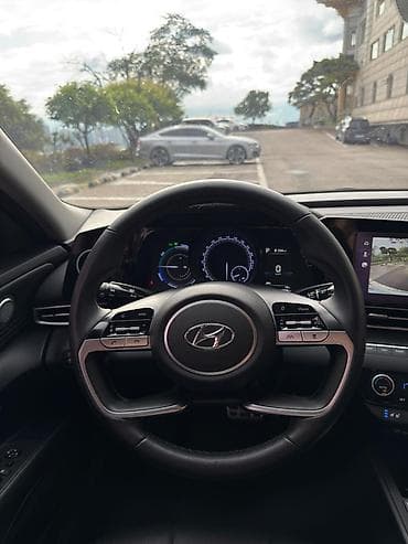 byd e7: Hyundai Elantra: 2021 г., 1.6 л, Автомат, Гибрид, Седан — 4