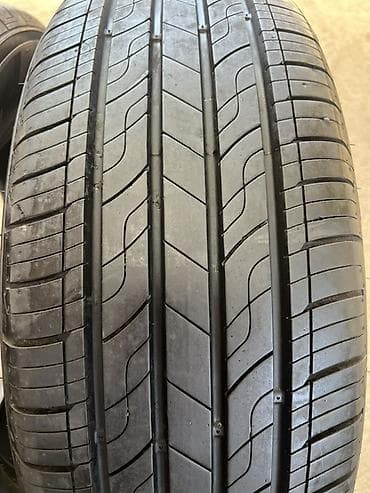 17: Летние шины Kumho 235/60 R17 102V, радиальные, бескамерные (Radial — 2