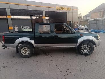 простой: Nissan Navara: 2015 г., 2.5 л, Механика, Бензин, Пикап — 3