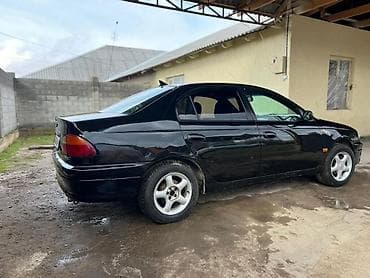 tlc 200: Toyota Avensis: 1999 г., 2 л, Механика, Бензин, Седан — 4