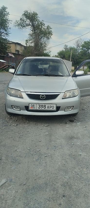 митсубиси спейк стар: Mazda 323: 2001 г., 1.6 л, Механика, Газ, Хэтчбэк — 7