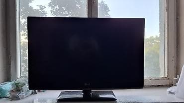 Телевизор LG, диагональ примерно 23–24" (около 58–61 см). Плоская