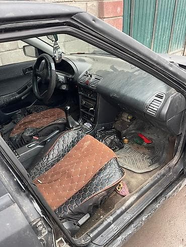 mx 5: Mazda 323: 1991 г., 1.8 л, Механика, Хэтчбэк — 1