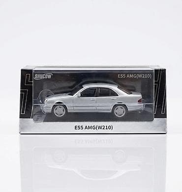 aston martin dbs: Модель автомобиля E55 AMG (W210) в фирменной коробке. - размер: длина — 1
