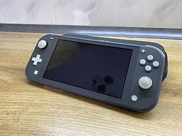 Портативные консоли: Продаю Nintendo Switch Lite чипованая Карта памяти 256gb Состояние — 4